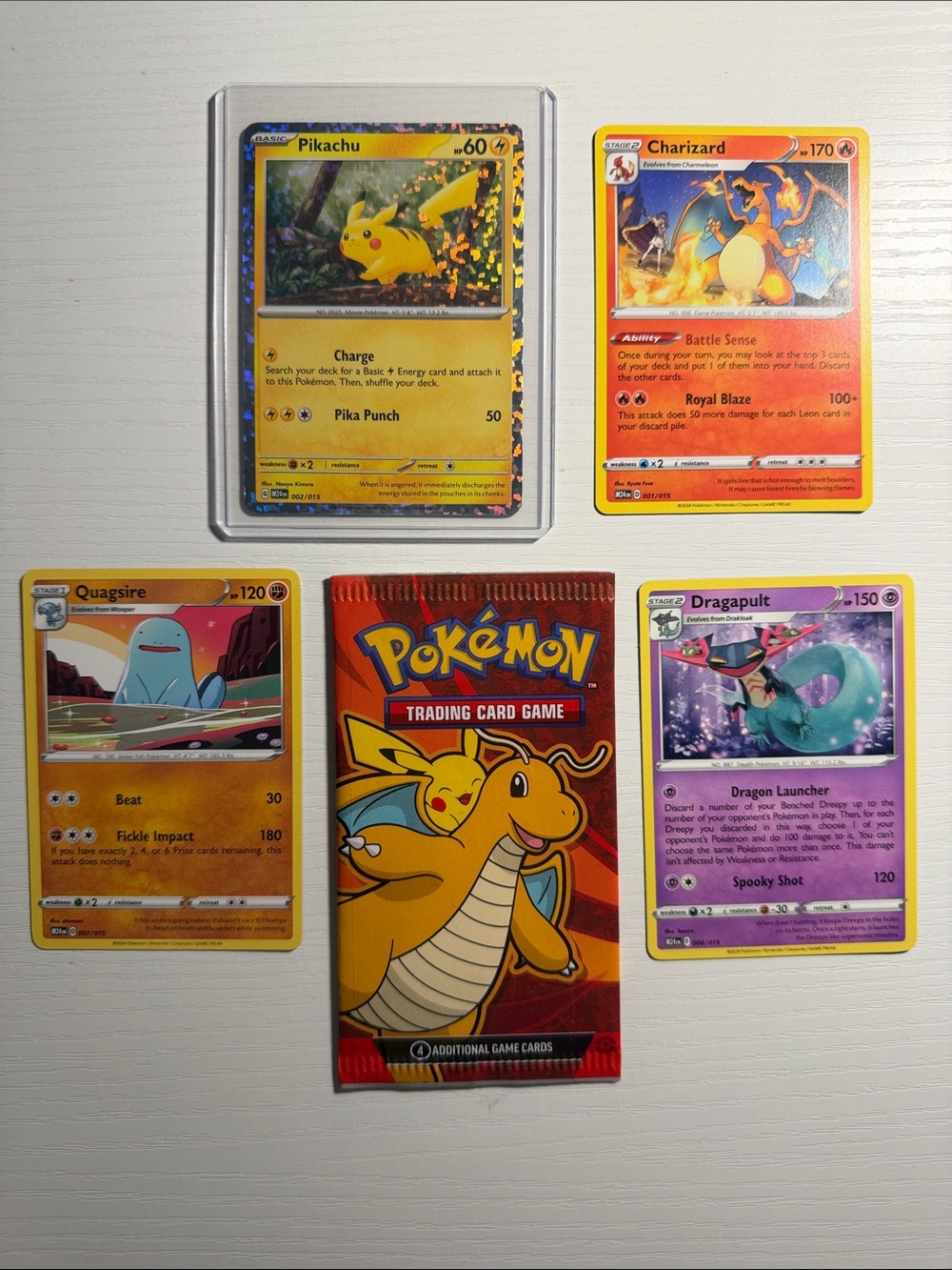 Pokémon Pikachu Charizard Quagsire DragapulyTrading Card Game Booster Pack